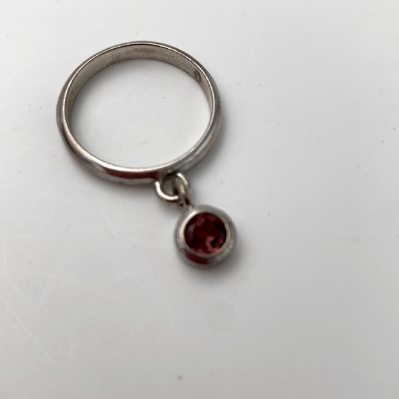 Sterling silver garnet charm ring. Stamped 925. Size 8.5 - Picture 2 of 5